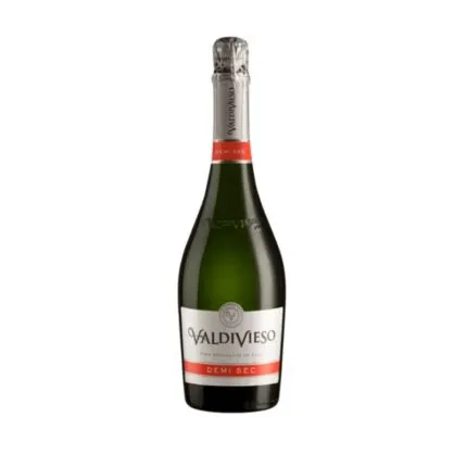 Botella de Espumante Valdivieso Demi Sec 750cc, con etiqueta clásica blanca y roja, fondo verde oscuro y capuchón plateado.