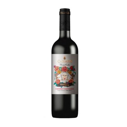 Vino tinto Carmen Frida Kahlo Reserva Cabernet Sauvignon 2022, Valle Central, Chile, con etiqueta floral ilustrada.
